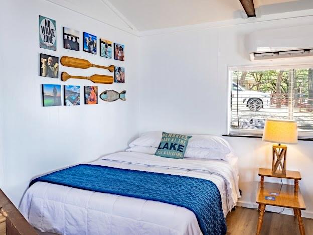 3817 Blue Fin Road Caddo, TX 76429 - Photo 23 of 40 a bedroom with a bed and a window