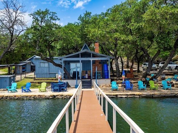 3817 Blue Fin Road Caddo, TX 76429 - Photo 35 of 40 swimming pool view with a seating space and a garden view