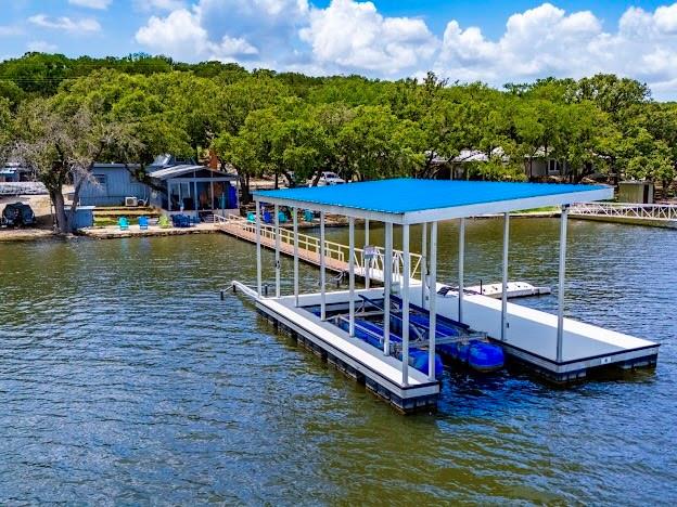 3817 Blue Fin Road Caddo, TX 76429 - Photo 36 of 40 a view of a house with pool and chairs