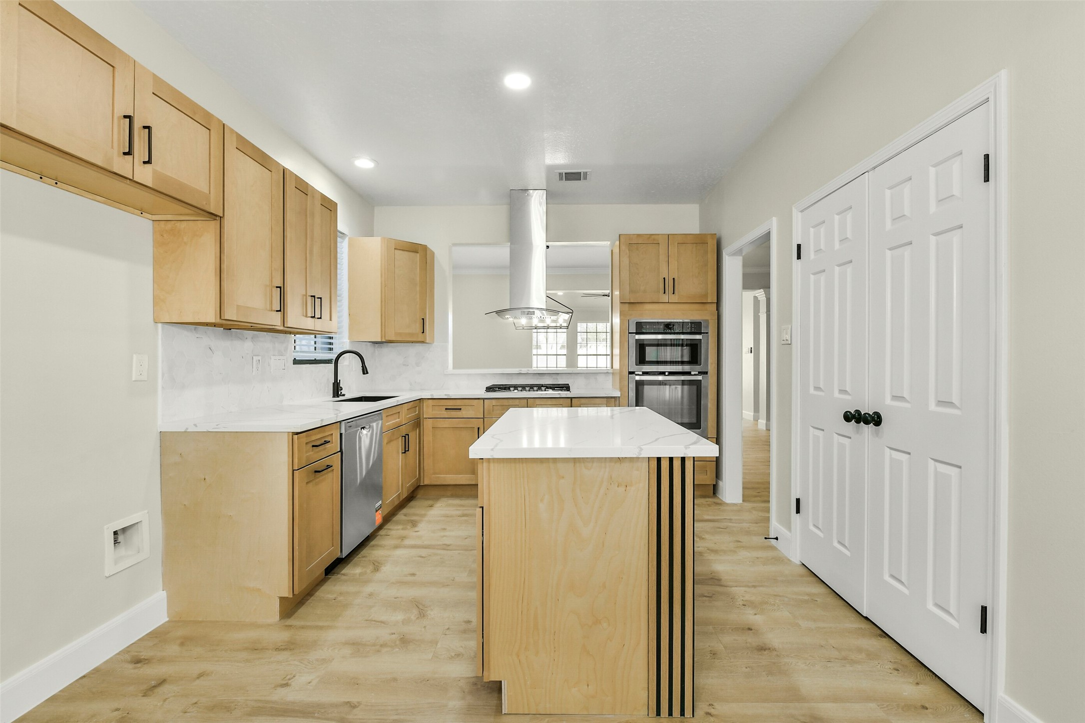 839 Quiet Spring Lane Houston, TX 77062 - Photo 4 of 28 Elegant white oak cabinets and quartz counters