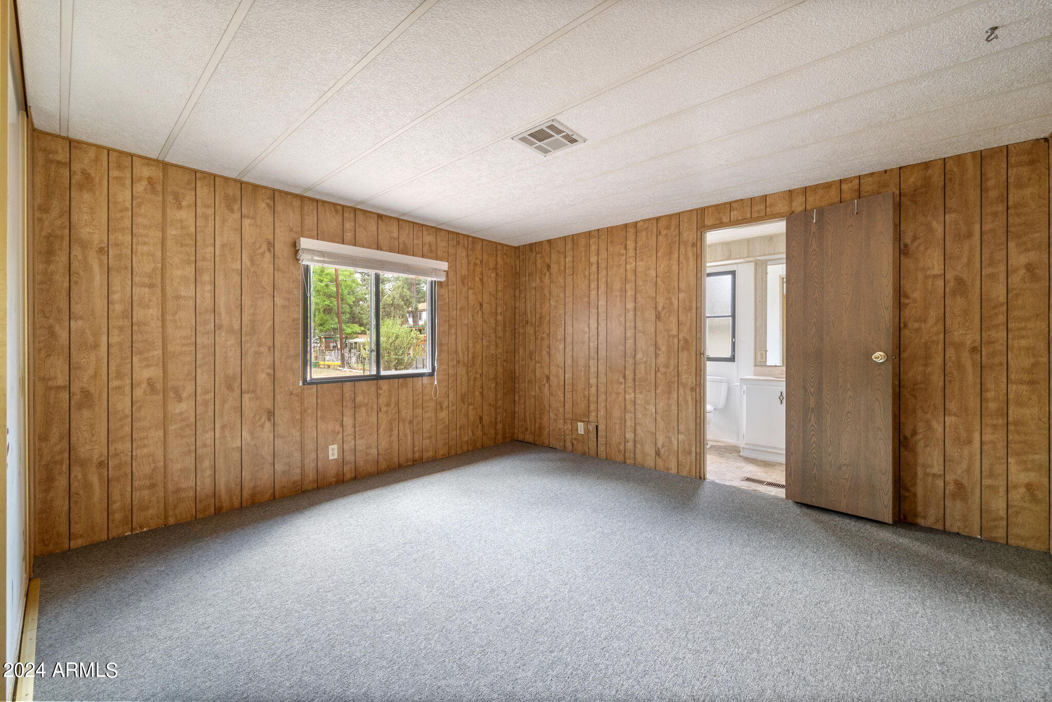 2858 Long Rifle Place Overgaard, AZ 85933 - Photo 9 of 28 OWNERS BEDROO,