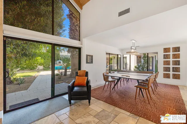 a bathroom with a tub and a shower