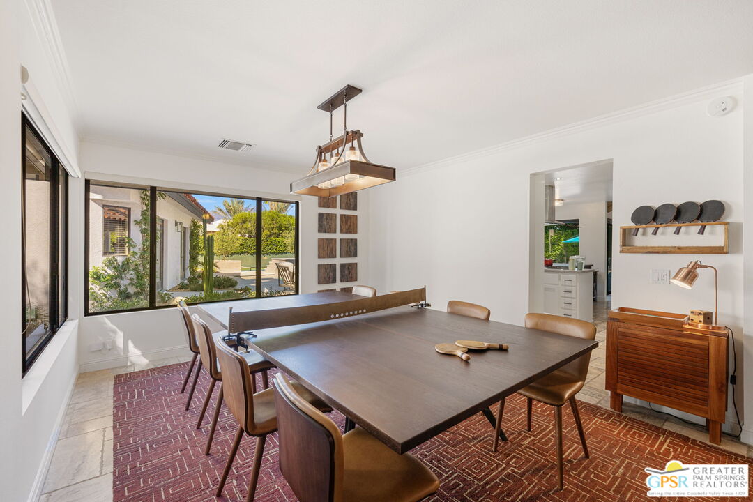 40563 Desert Creek Lane Rancho Mirage, CA 92270 - Photo 31 of 75 a view of a dining room with furniture window and outside view