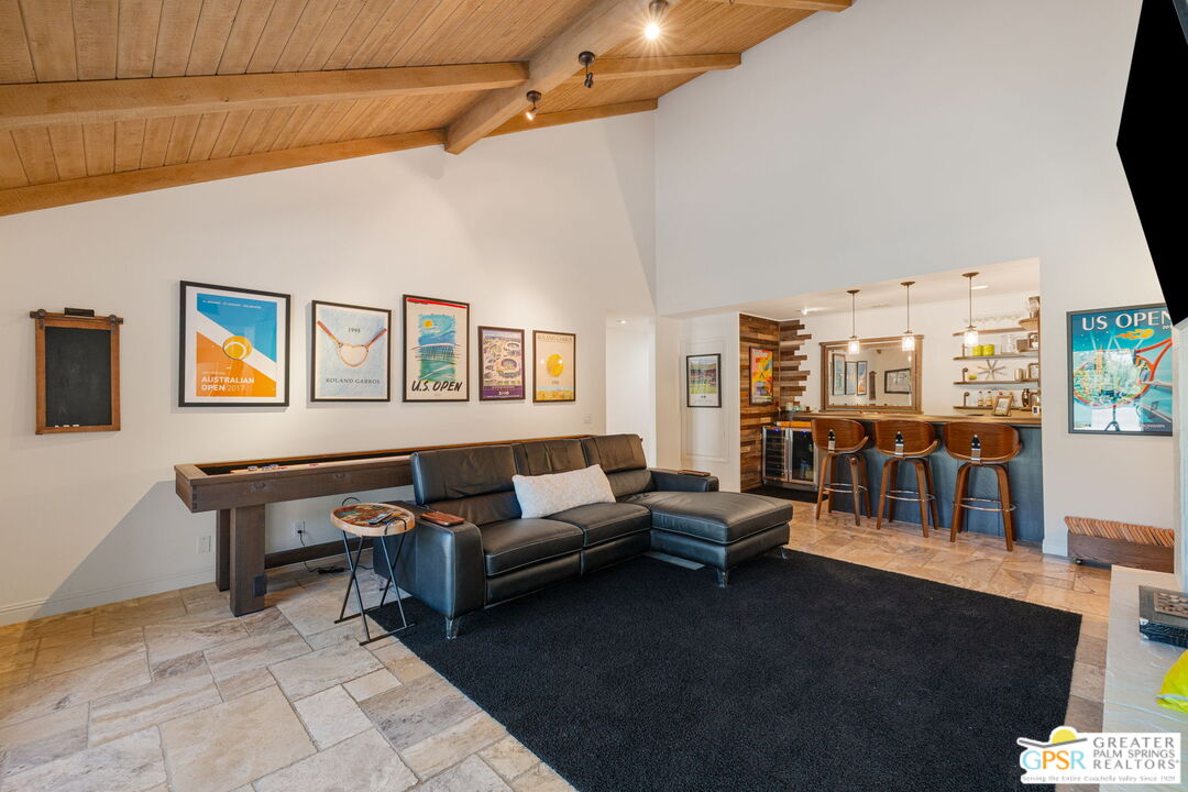 40563 Desert Creek Lane Rancho Mirage, CA 92270 - Photo 39 of 75 a living room with furniture and a table