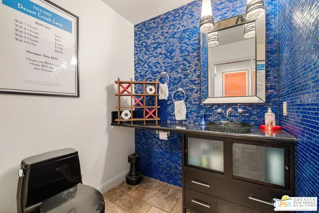 a view of a kitchen with kitchen island dining table and chairs