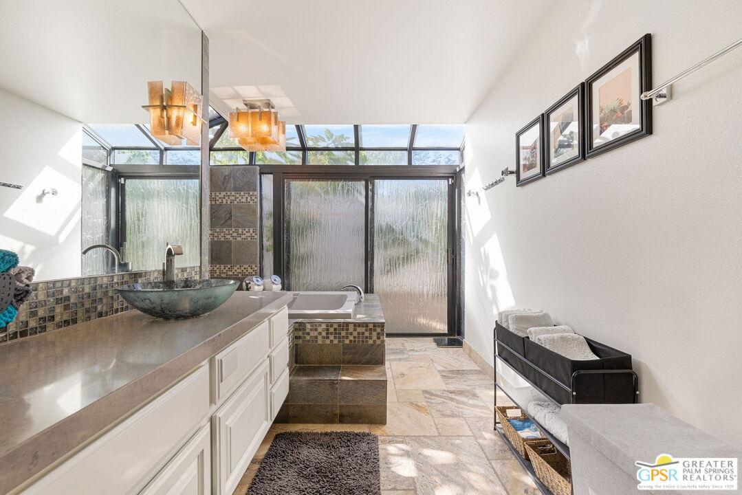 40563 Desert Creek Lane Rancho Mirage, CA 92270 - Photo 47 of 75 a kitchen with stainless steel appliances granite countertop a sink and a stove
