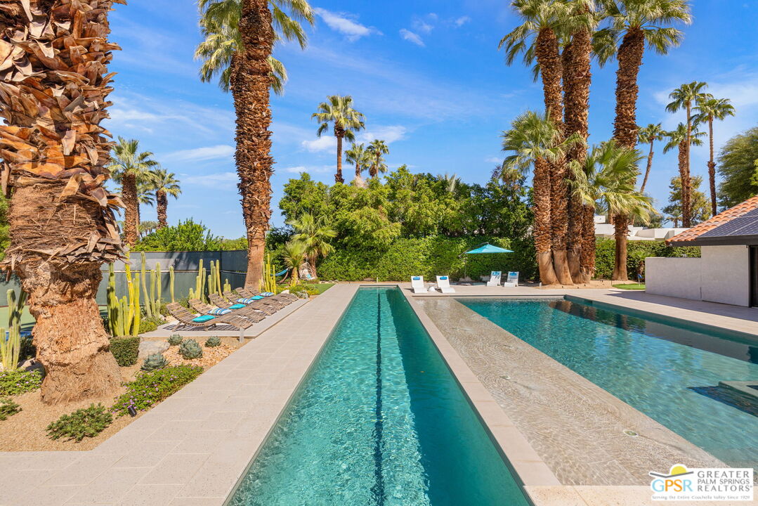 40563 Desert Creek Lane Rancho Mirage, CA 92270 - Photo 68 of 75 a view of swimming pool with a yard