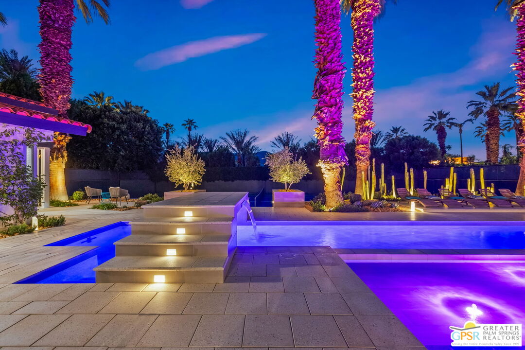 40563 Desert Creek Lane Rancho Mirage, CA 92270 - Photo 7 of 75 a view of swimming pool with sitting area and fire pit