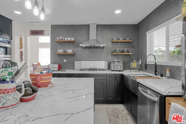 a bed room with a bed and a couch