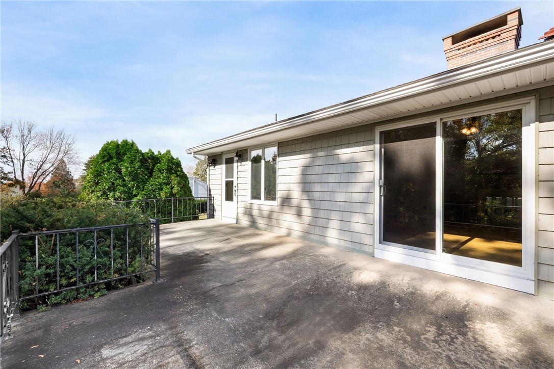 23 Hillview Drive Westerly, RI 02891 - Photo 13 of 32 Patio off of family room and kitchen