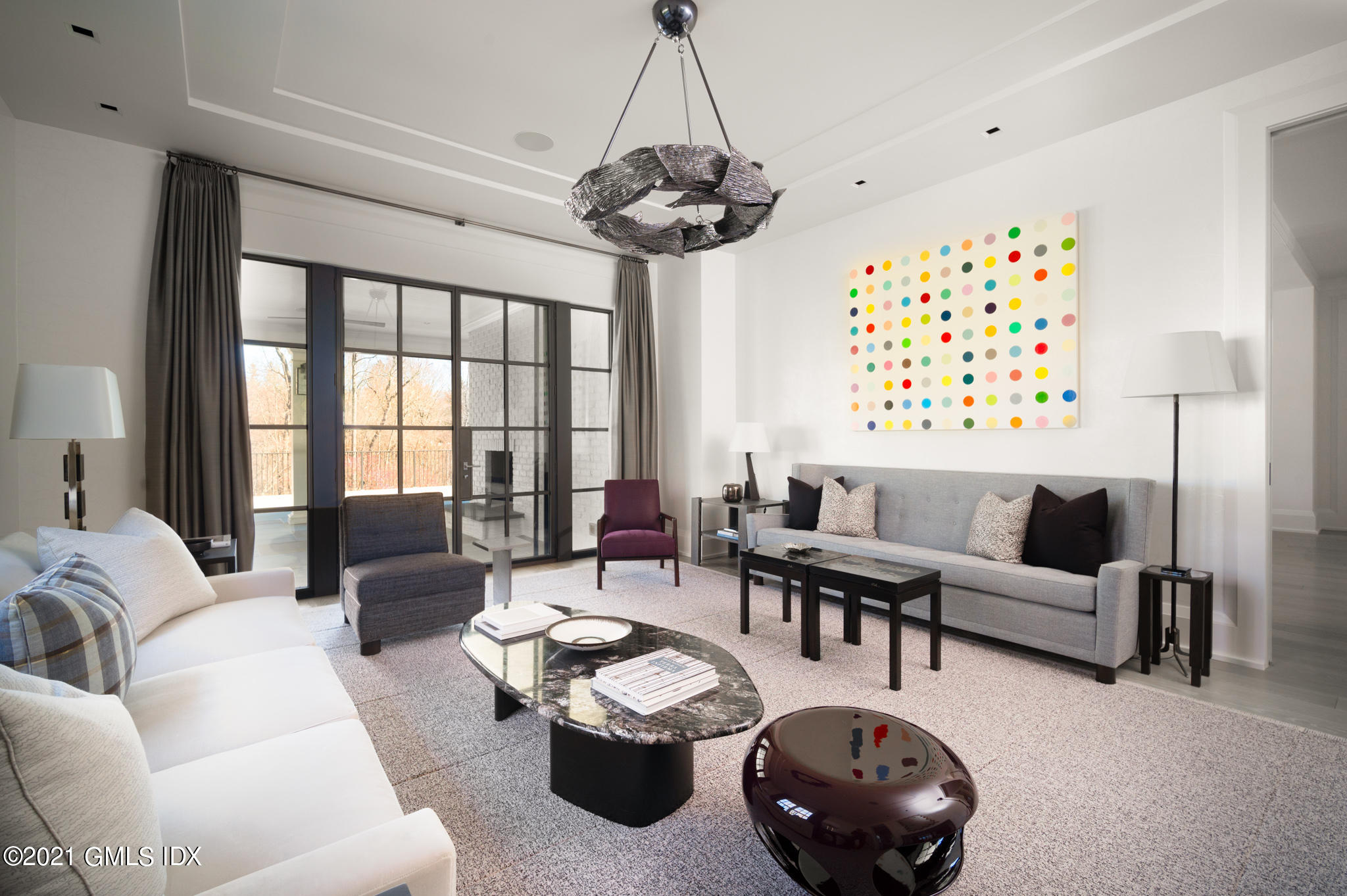 425 North Maple Avenue Greenwich, CT 06830 - Photo 13 of 30 a living room with furniture and a large window