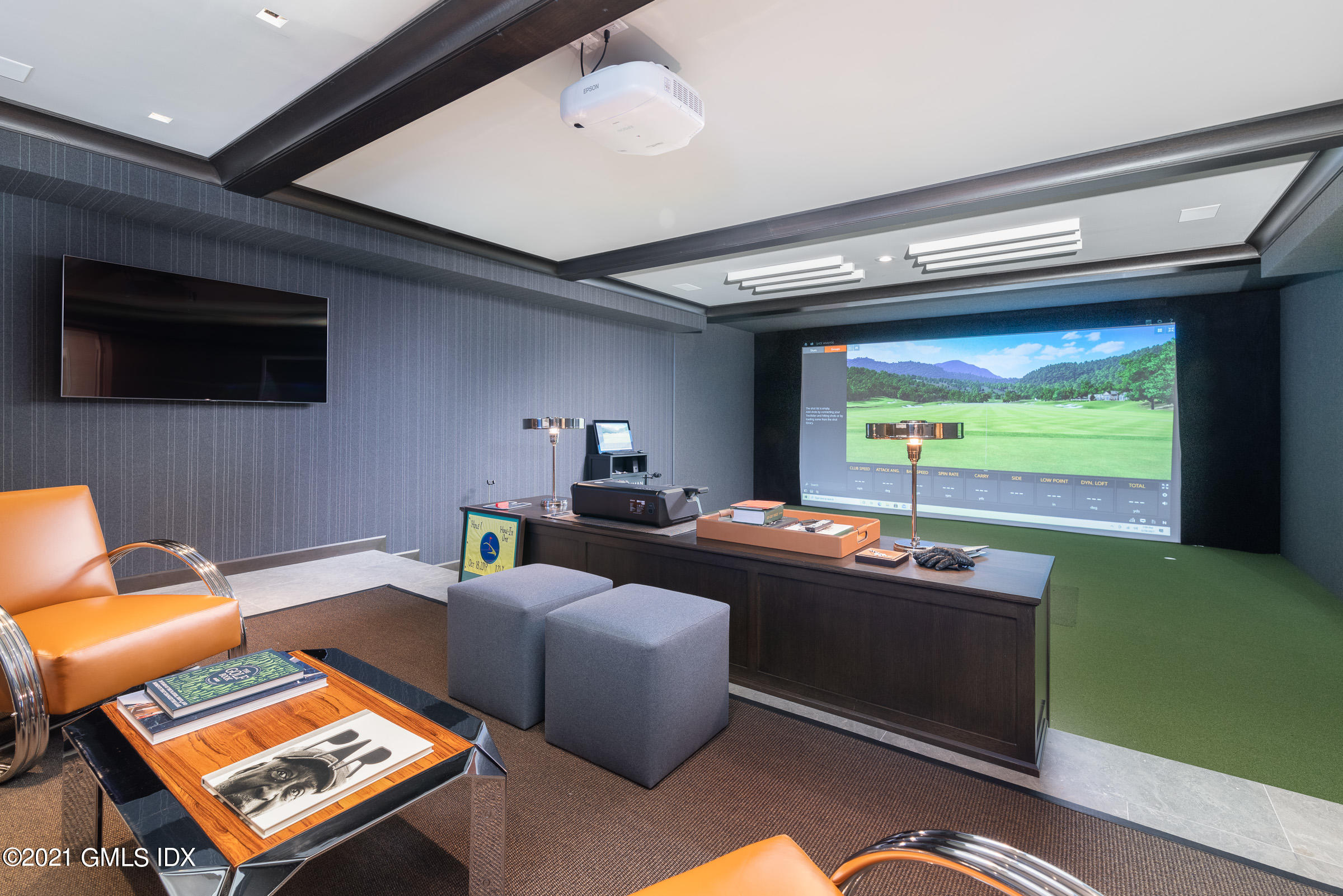 425 North Maple Avenue Greenwich, CT 06830 - Photo 22 of 30 a living room with furniture and a flat screen tv