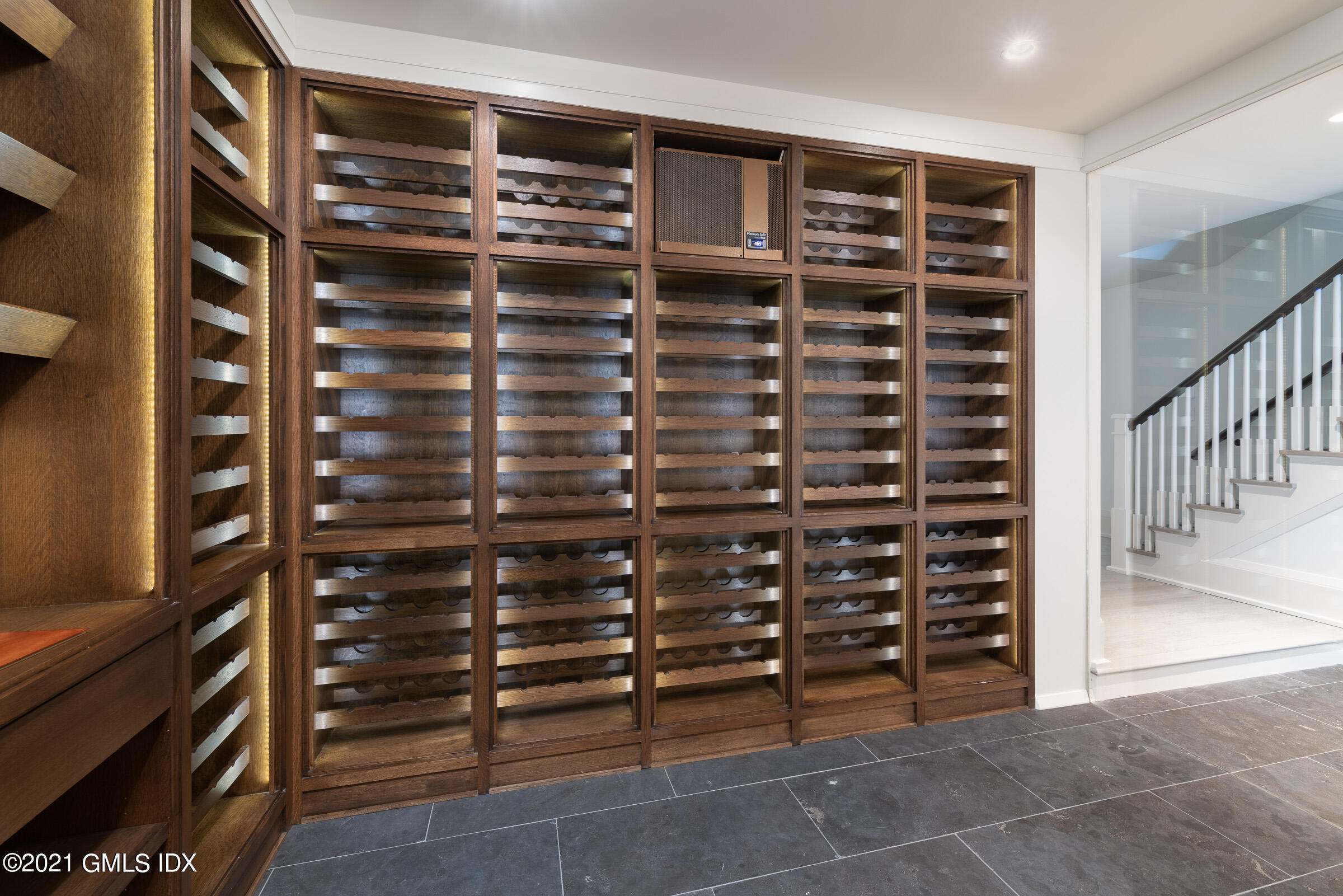 425 North Maple Avenue Greenwich, CT 06830 - Photo 24 of 30 a view of walk in closet with clothes