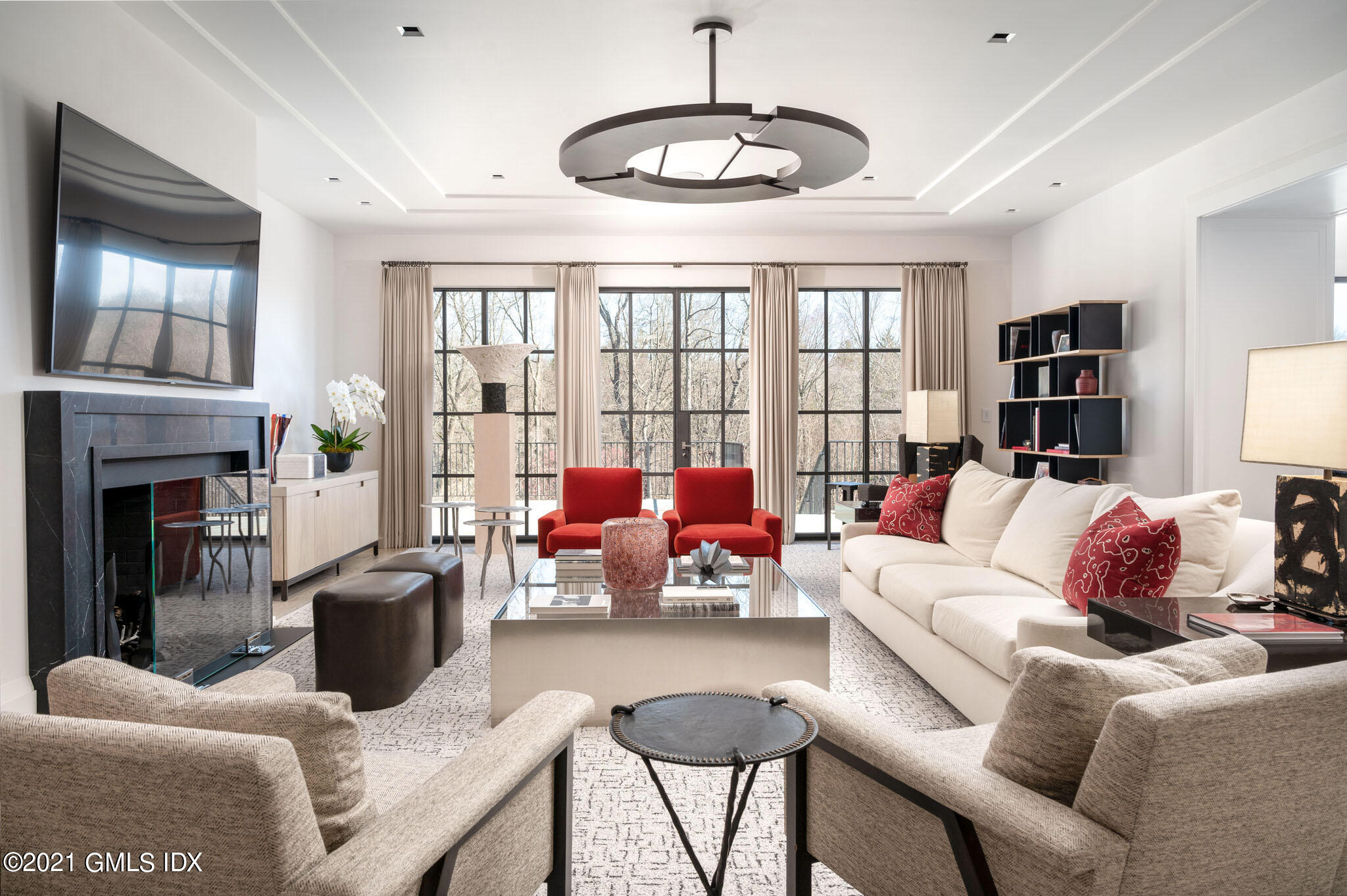 425 North Maple Avenue Greenwich, CT 06830 - Photo 6 of 30 a living room with furniture fireplace and a large window