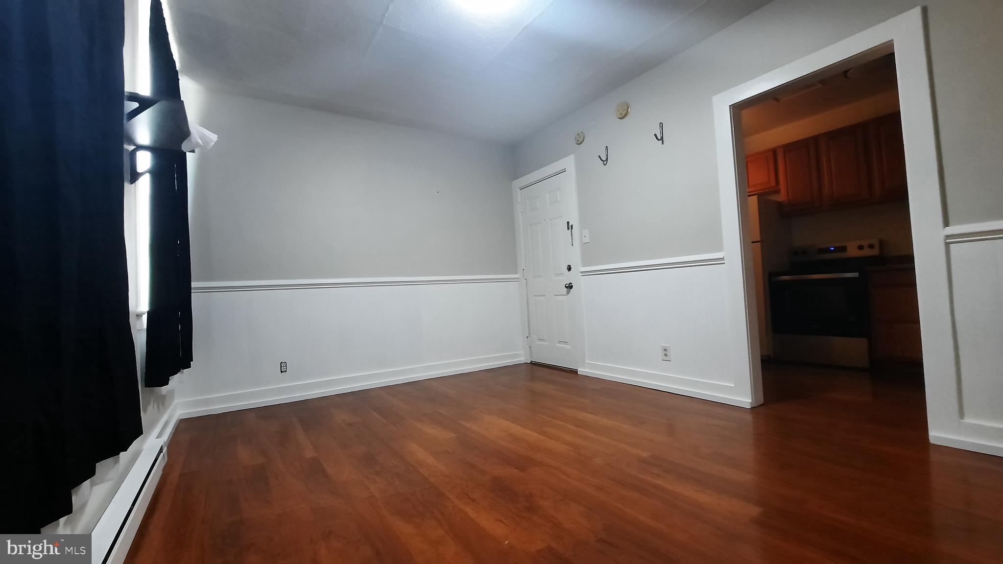 10 Blue Ridge Avenue, Unit 4 Front Royal, VA 22630 - Photo 3 of 10 Living Room (reverse view)