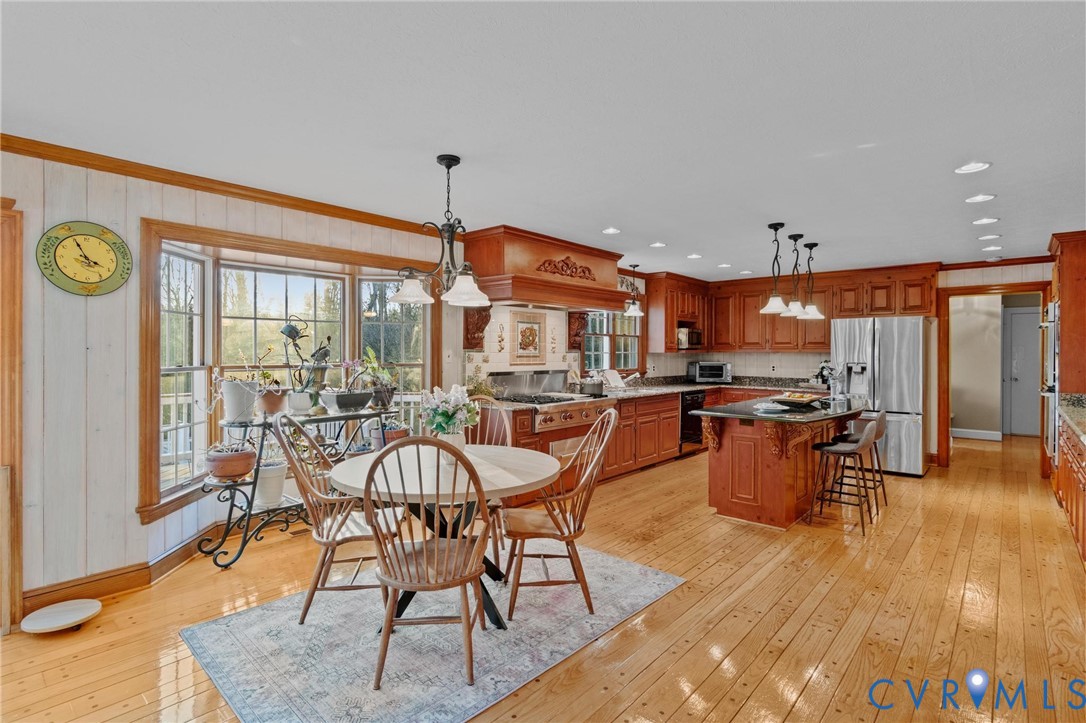 1517 Old Church Road Mechanicsville, VA 23111 - Photo 13 of 50 Dining area with light wood-type flooring and orna