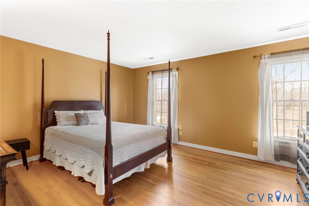 1517 Old Church Road Mechanicsville, VA 23111 - Photo 26 of 50 Bedroom featuring light wood-type flooring and bas