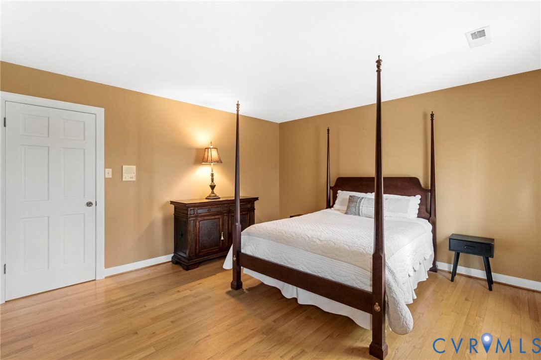 1517 Old Church Road Mechanicsville, VA 23111 - Photo 27 of 50 Bedroom featuring light wood-style flooring and ba