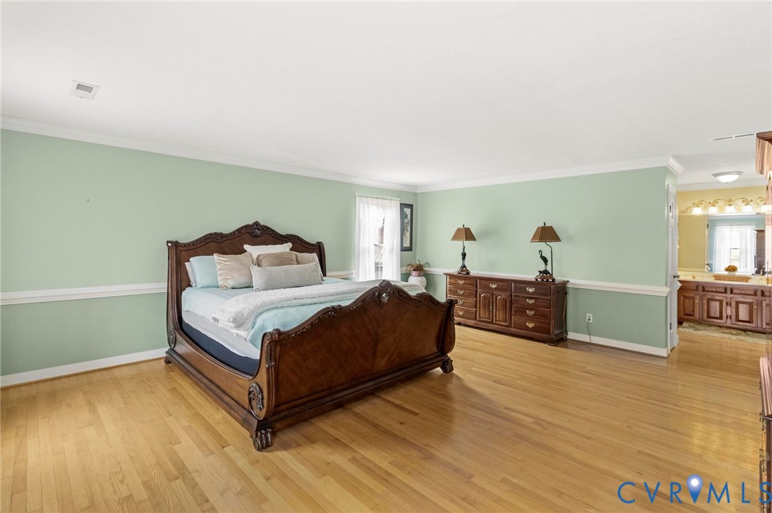 1517 Old Church Road Mechanicsville, VA 23111 - Photo 29 of 50 Bedroom with light wood finished floors and crown