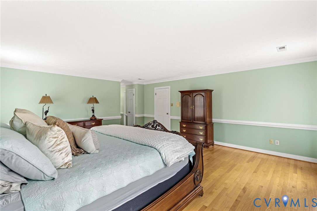 1517 Old Church Road Mechanicsville, VA 23111 - Photo 30 of 50 Bedroom with hardwood / wood-style flooring and cr