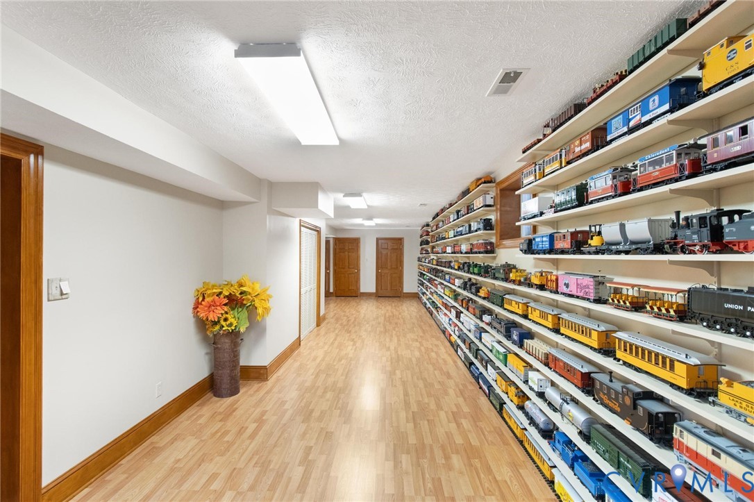 1517 Old Church Road Mechanicsville, VA 23111 - Photo 36 of 50 Hall featuring a textured ceiling and light wood-t