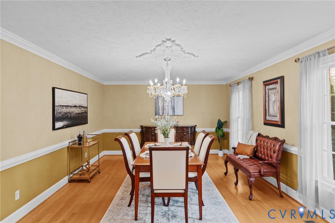 1517 Old Church Road Mechanicsville, VA 23111 - Photo 6 of 50 Dining area featuring a chandelier, light wood-sty