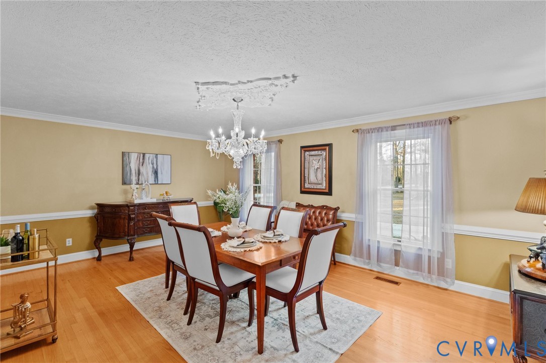 1517 Old Church Road Mechanicsville, VA 23111 - Photo 7 of 50 Dining room featuring light wood-style floors, a c