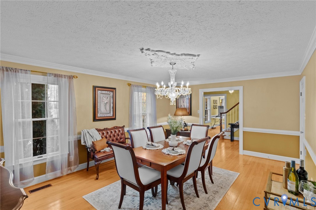 1517 Old Church Road Mechanicsville, VA 23111 - Photo 8 of 50 Dining space with light wood-style flooring, stair