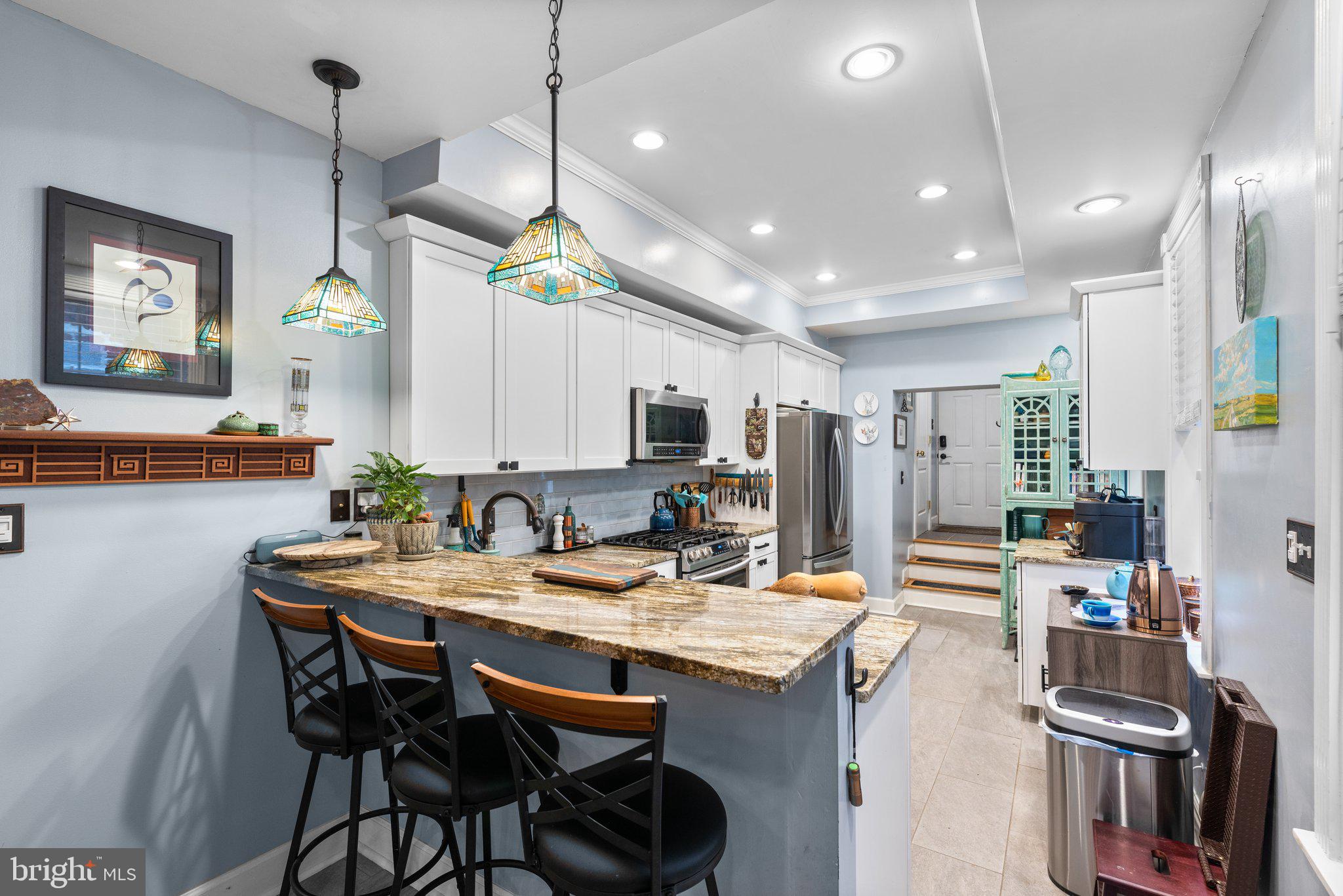 3228 Fait Avenue Baltimore, MD 21224 - Photo 13 of 44 a kitchen with a table and chairs in it
