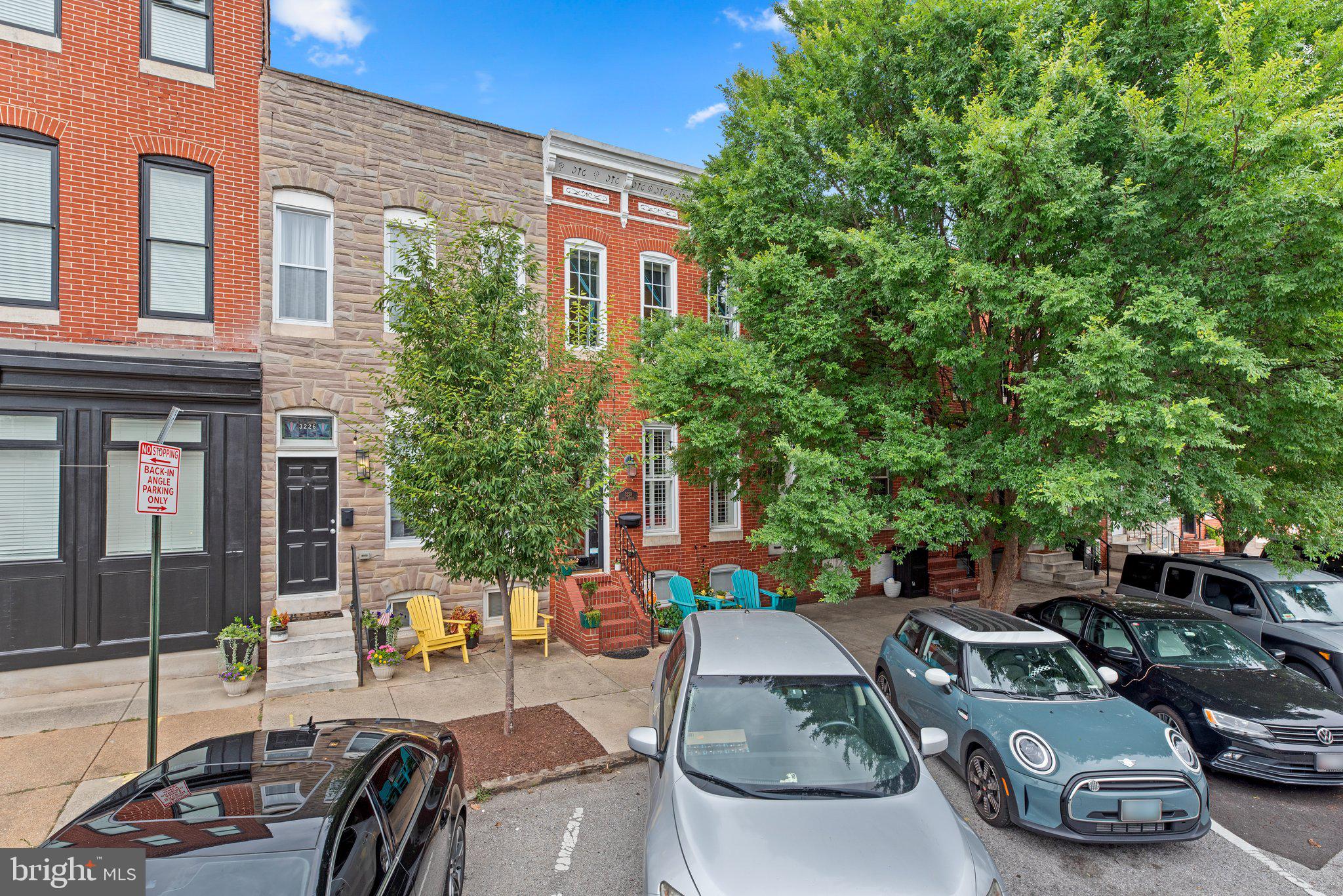 3228 Fait Avenue Baltimore, MD 21224 - Photo 2 of 44 a view of a patio with table and chairs potted plants