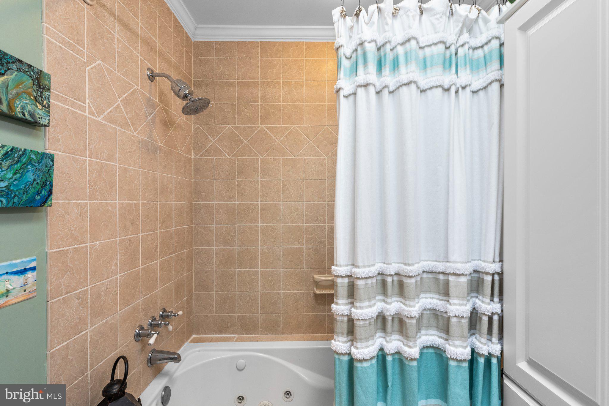3228 Fait Avenue Baltimore, MD 21224 - Photo 25 of 44 a bathroom with a bathtub and shower
