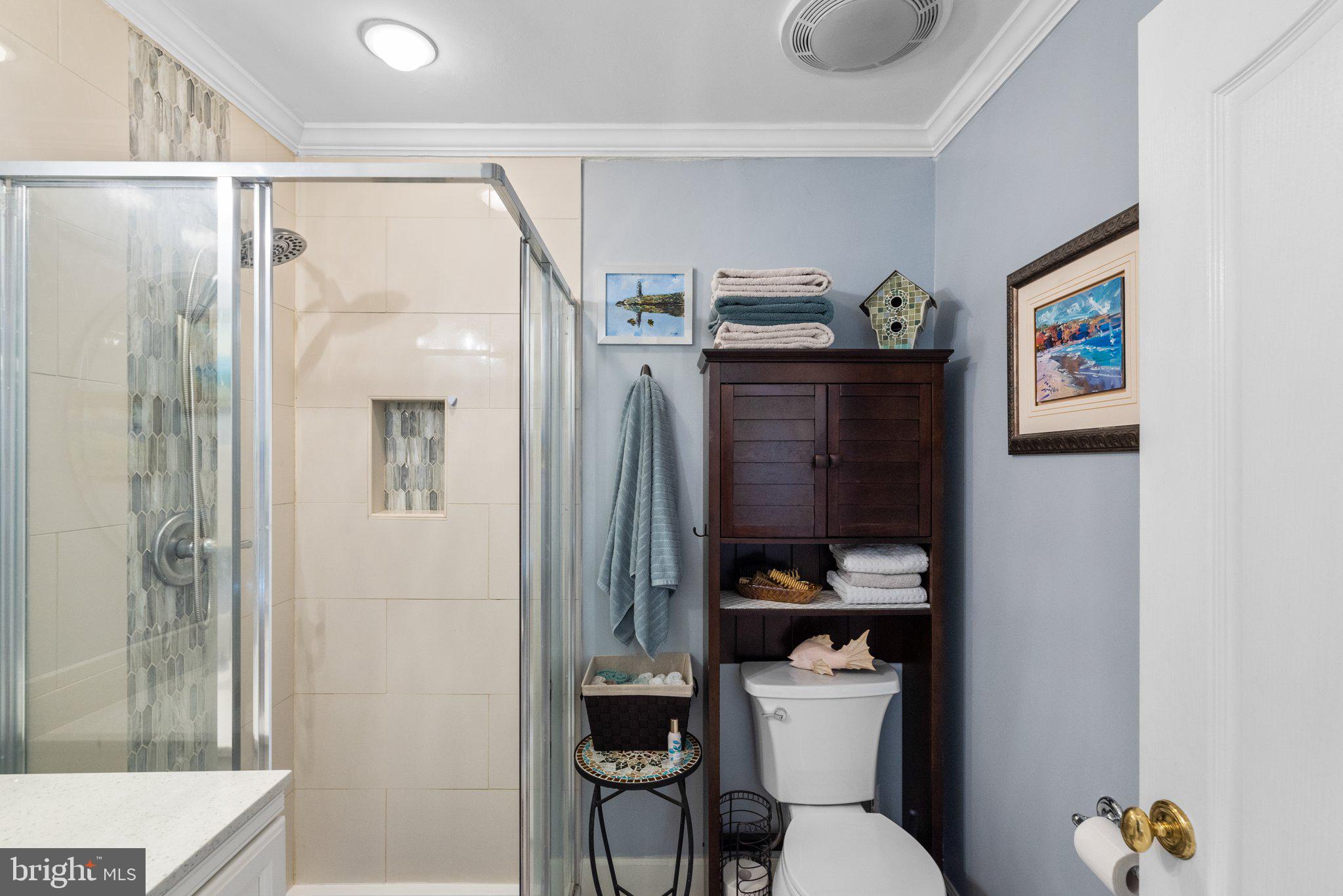 3228 Fait Avenue Baltimore, MD 21224 - Photo 29 of 44 a bathroom with a granite countertop sink toilet and shower