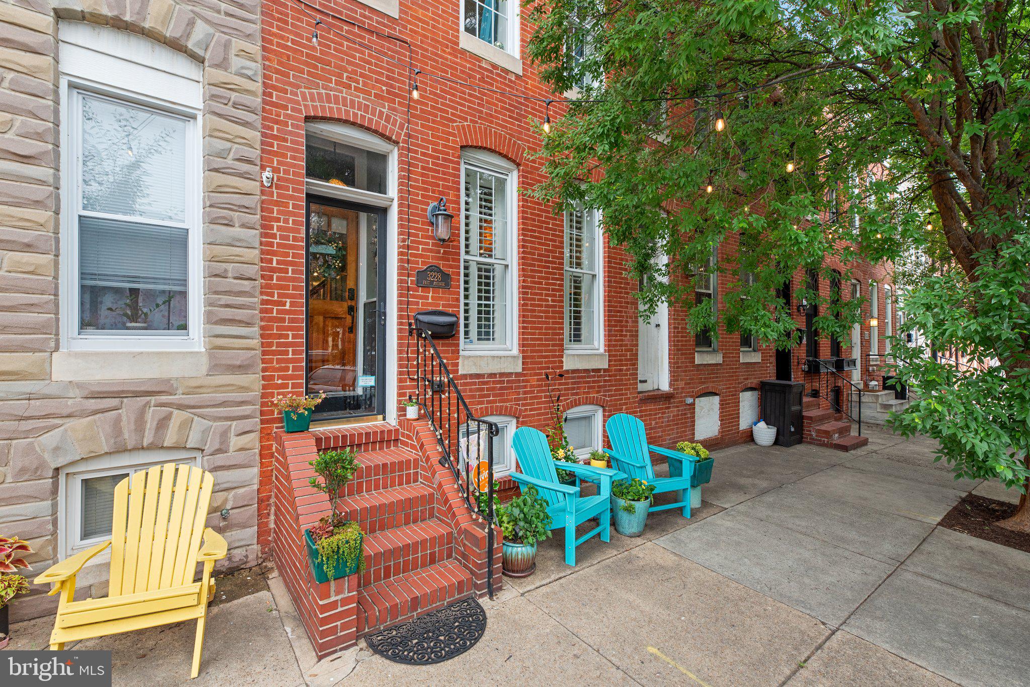 3228 Fait Avenue Baltimore, MD 21224 - Photo 3 of 44 a view of a patio with chairs and potted plants