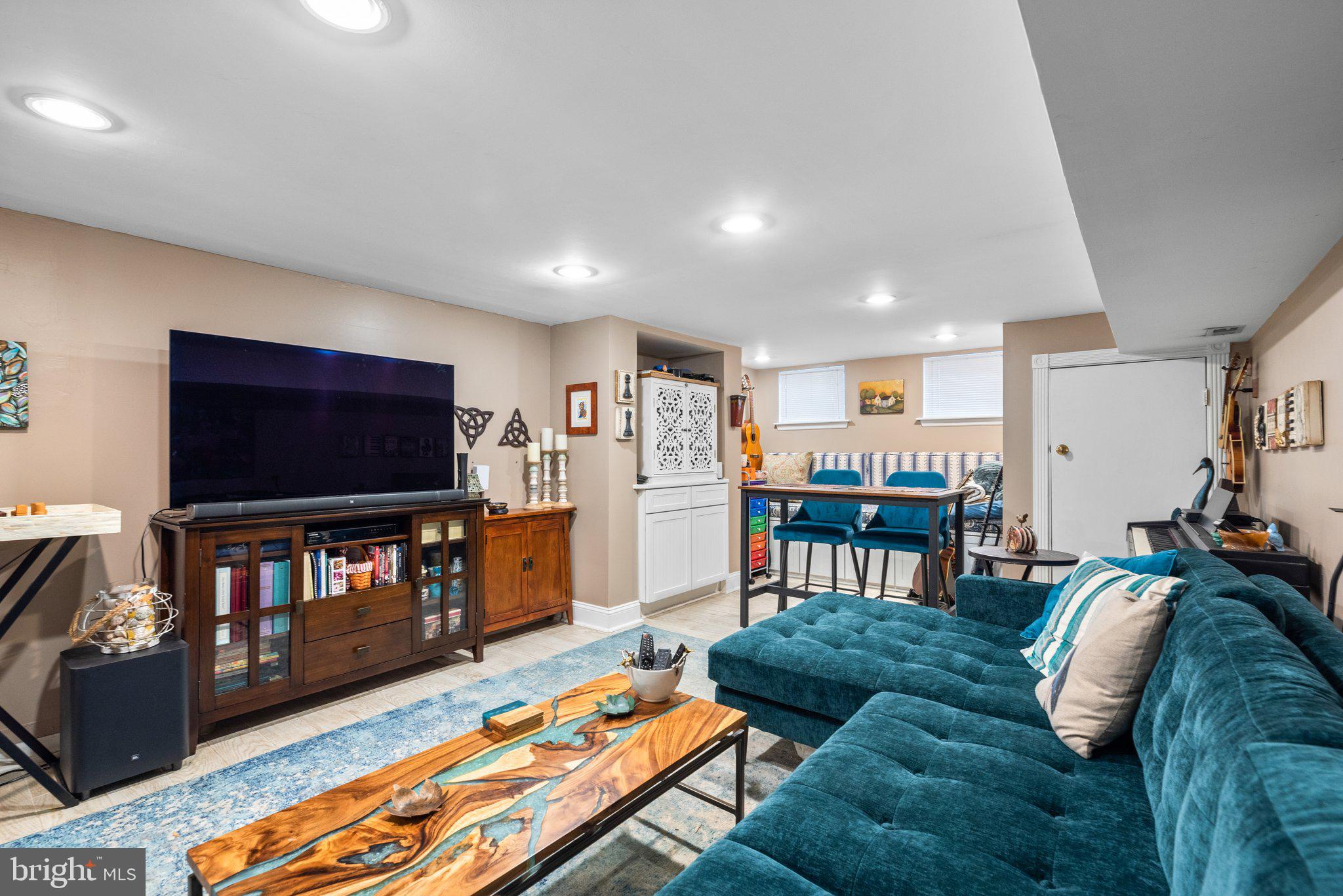 3228 Fait Avenue Baltimore, MD 21224 - Photo 31 of 44 a living room with furniture and a flat screen tv