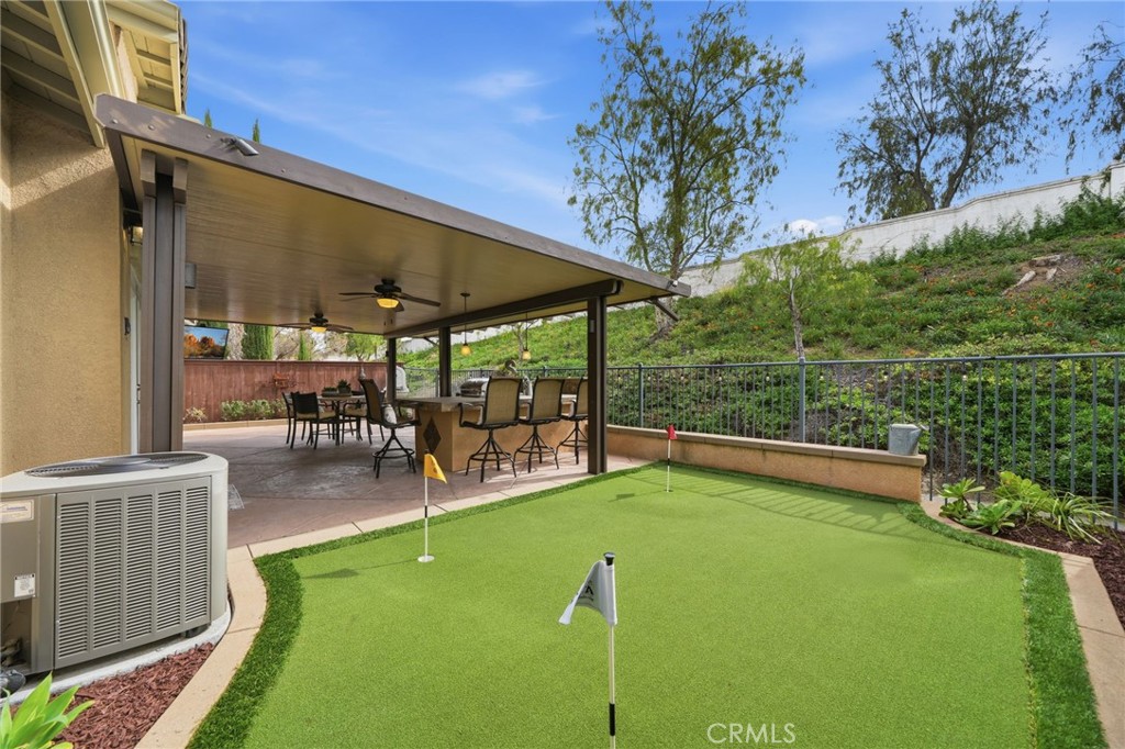 33433 Emerson Way, Unit A Temecula, CA 92592 - Photo 23 of 31 a view of outdoor space yard deck patio and swimming pool