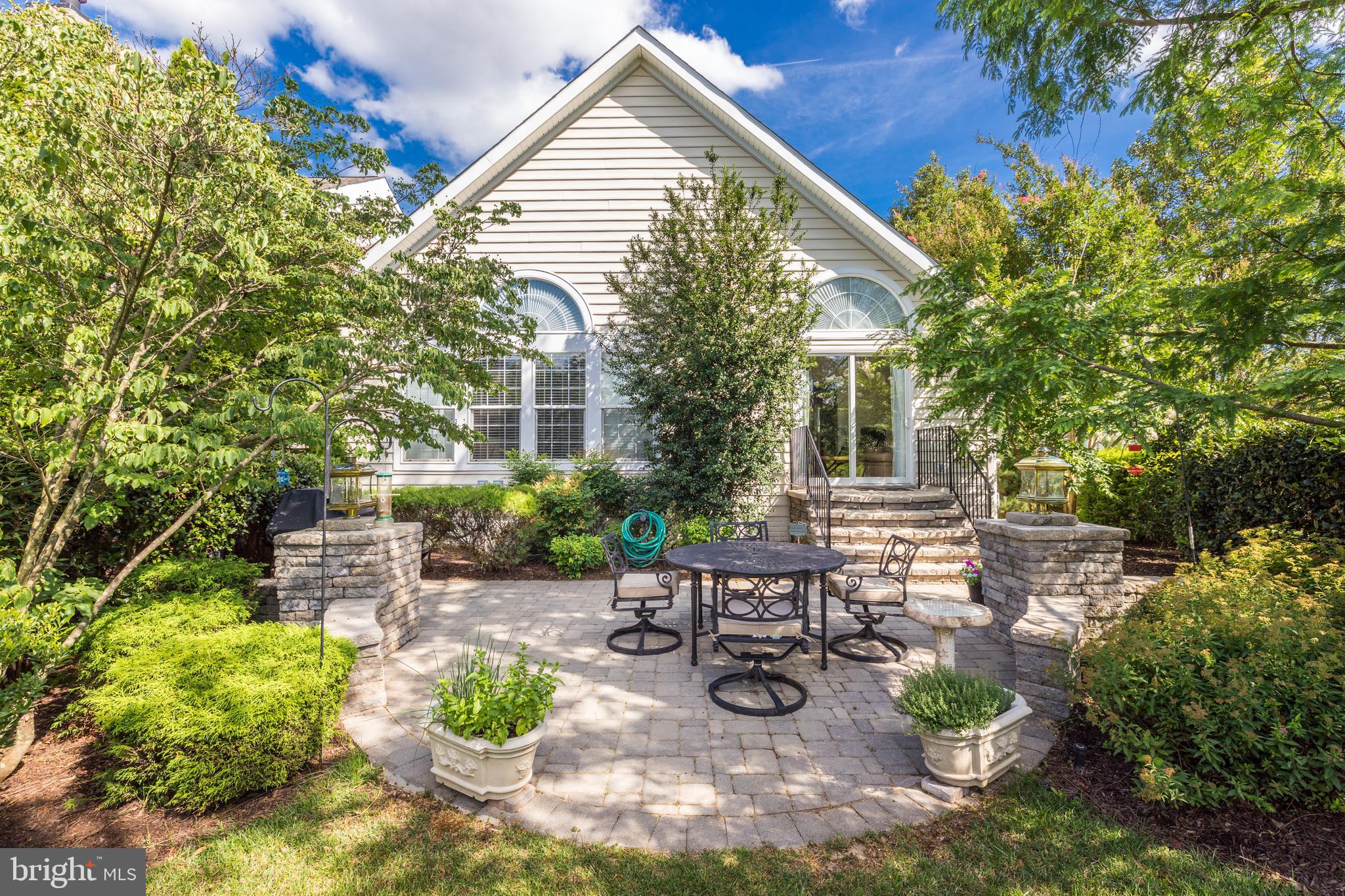 20135 Valhalla Square Ashburn, VA 20147 - Photo 34 of 41 a view of a house with backyard and sitting area