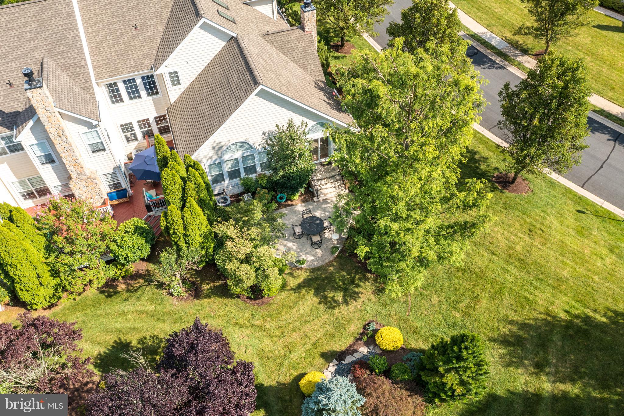 20135 Valhalla Square Ashburn, VA 20147 - Photo 37 of 41 a backyard of a house with a yard and outdoor seating