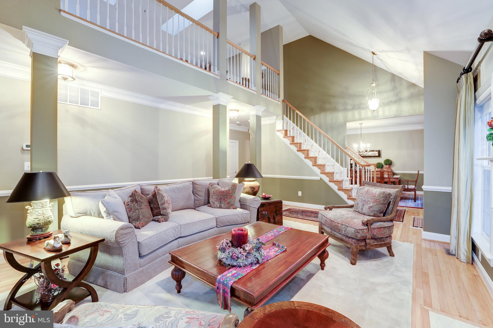 20135 Valhalla Square Ashburn, VA 20147 - Photo 6 of 41 a living room with furniture and wooden floor
