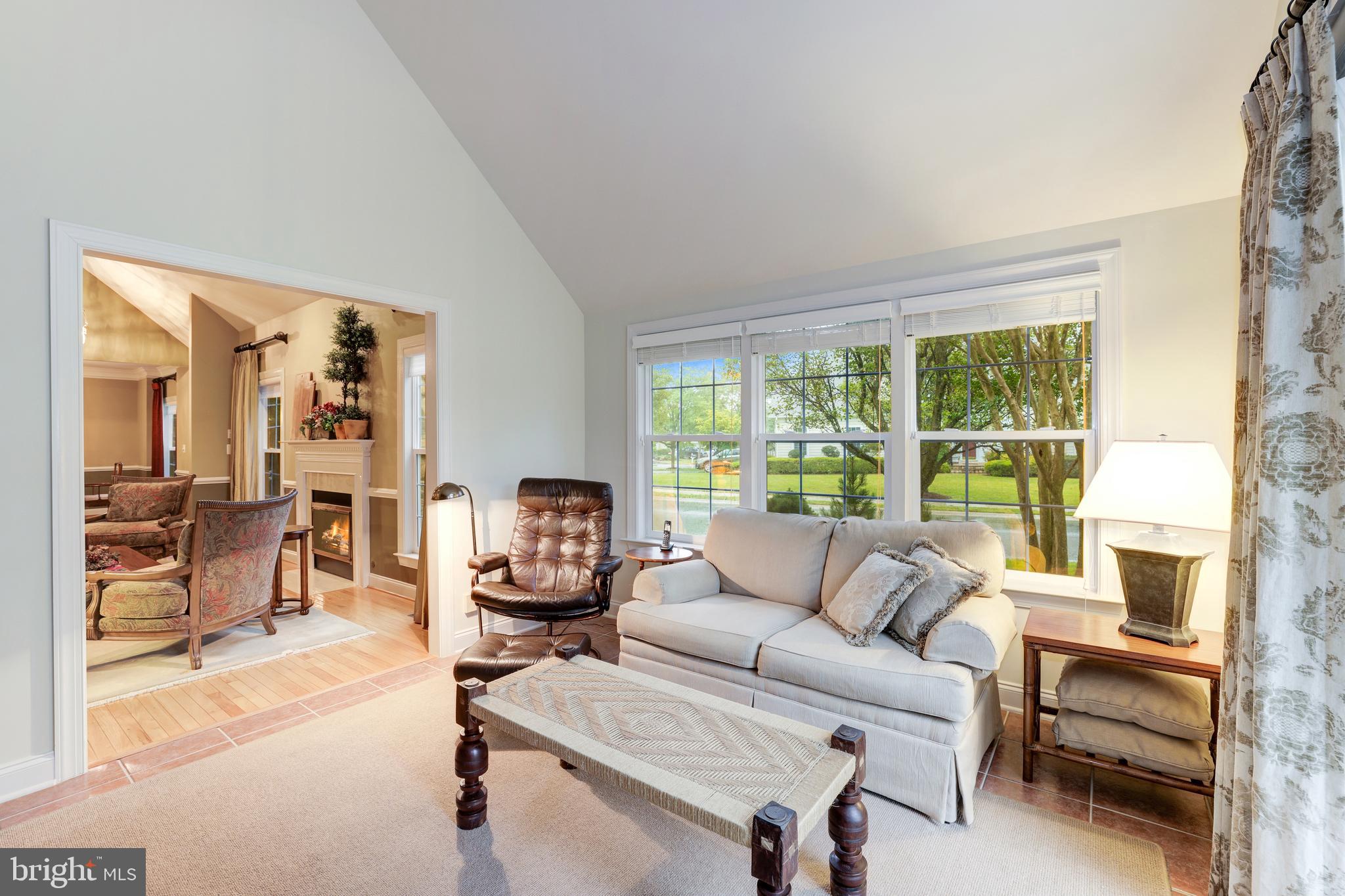 20135 Valhalla Square Ashburn, VA 20147 - Photo 8 of 41 a living room with furniture and a window