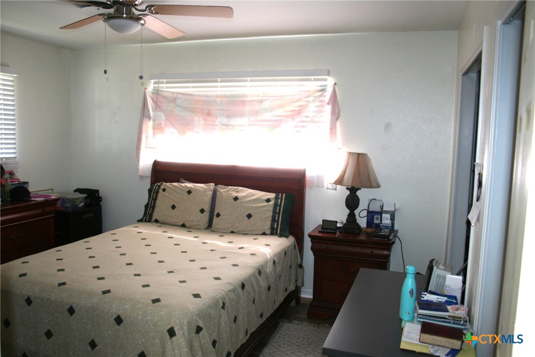 1611 North 10th Street Killeen, TX 76541 - Photo 21 of 31 a bedroom with a bed and a window