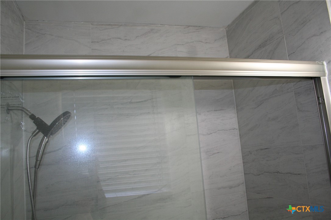 1611 North 10th Street Killeen, TX 76541 - Photo 27 of 31 a close view of bathroom shower