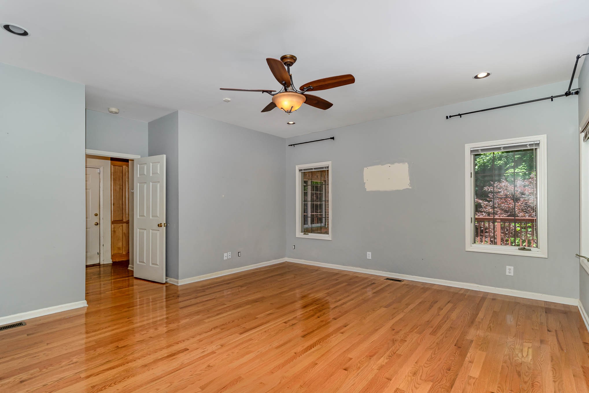 1102 Dora Whitley Road Franklin, TN 37064 - Photo 17 of 42 a view of an empty room with window and wooden floor