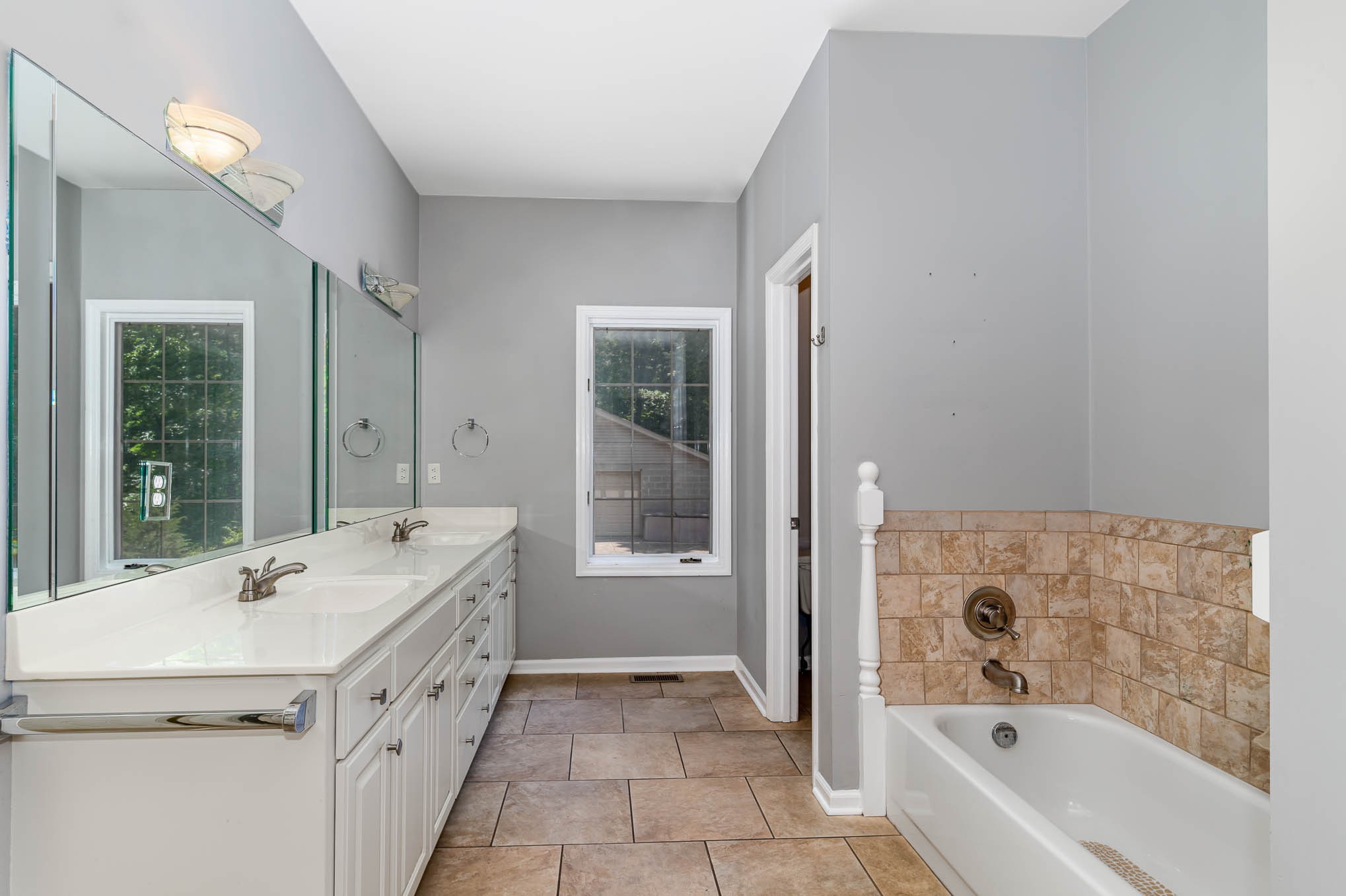 1102 Dora Whitley Road Franklin, TN 37064 - Photo 20 of 42 a bathroom with a tub sink and mirror