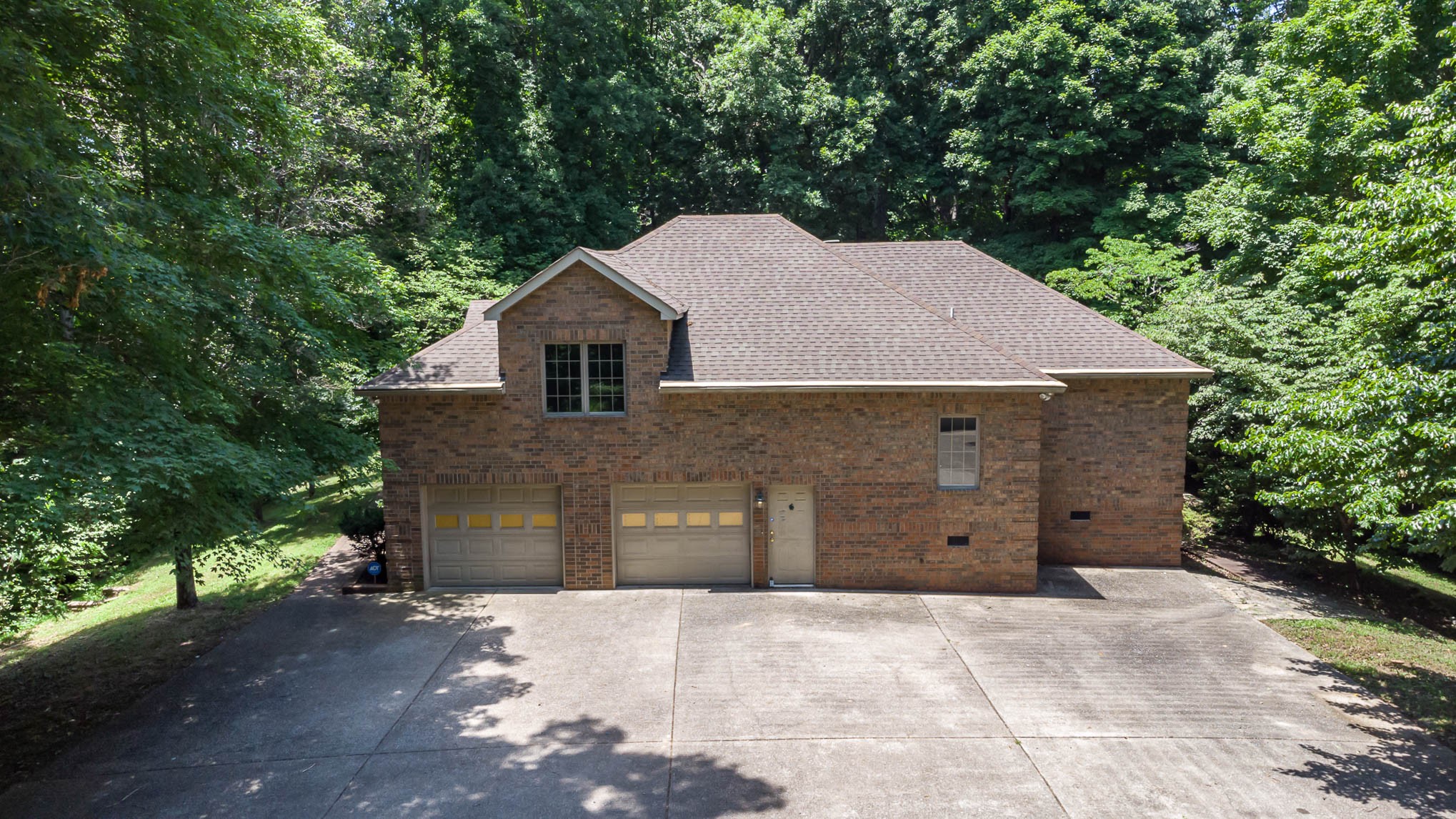 1102 Dora Whitley Road Franklin, TN 37064 - Photo 3 of 42 a view of a house with a backyard and large trees