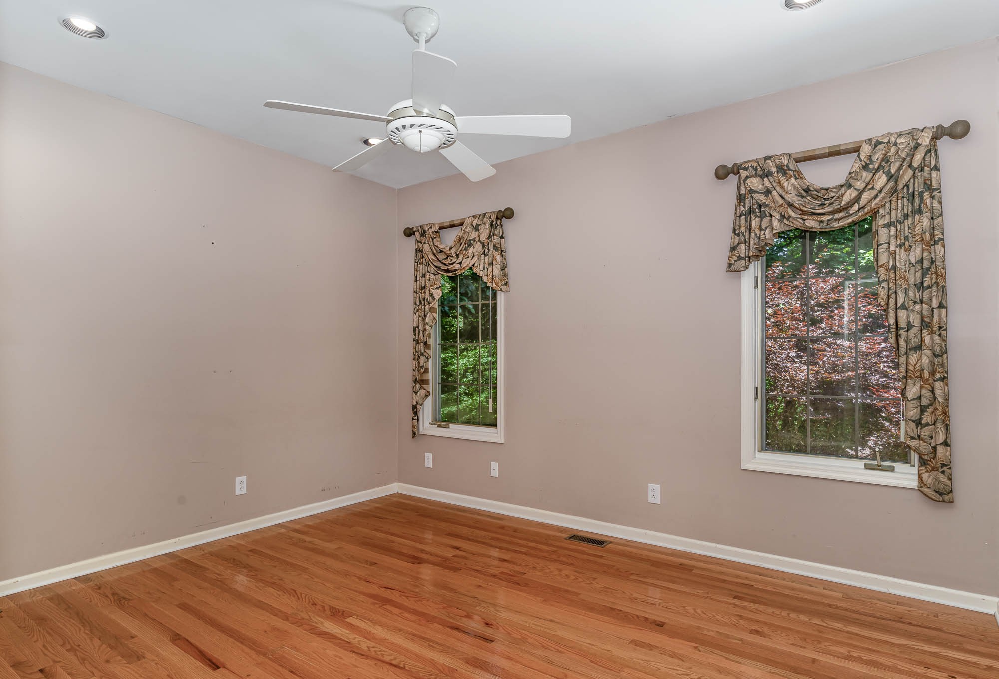 1102 Dora Whitley Road Franklin, TN 37064 - Photo 23 of 42 a view of an empty room with wooden floor and a window