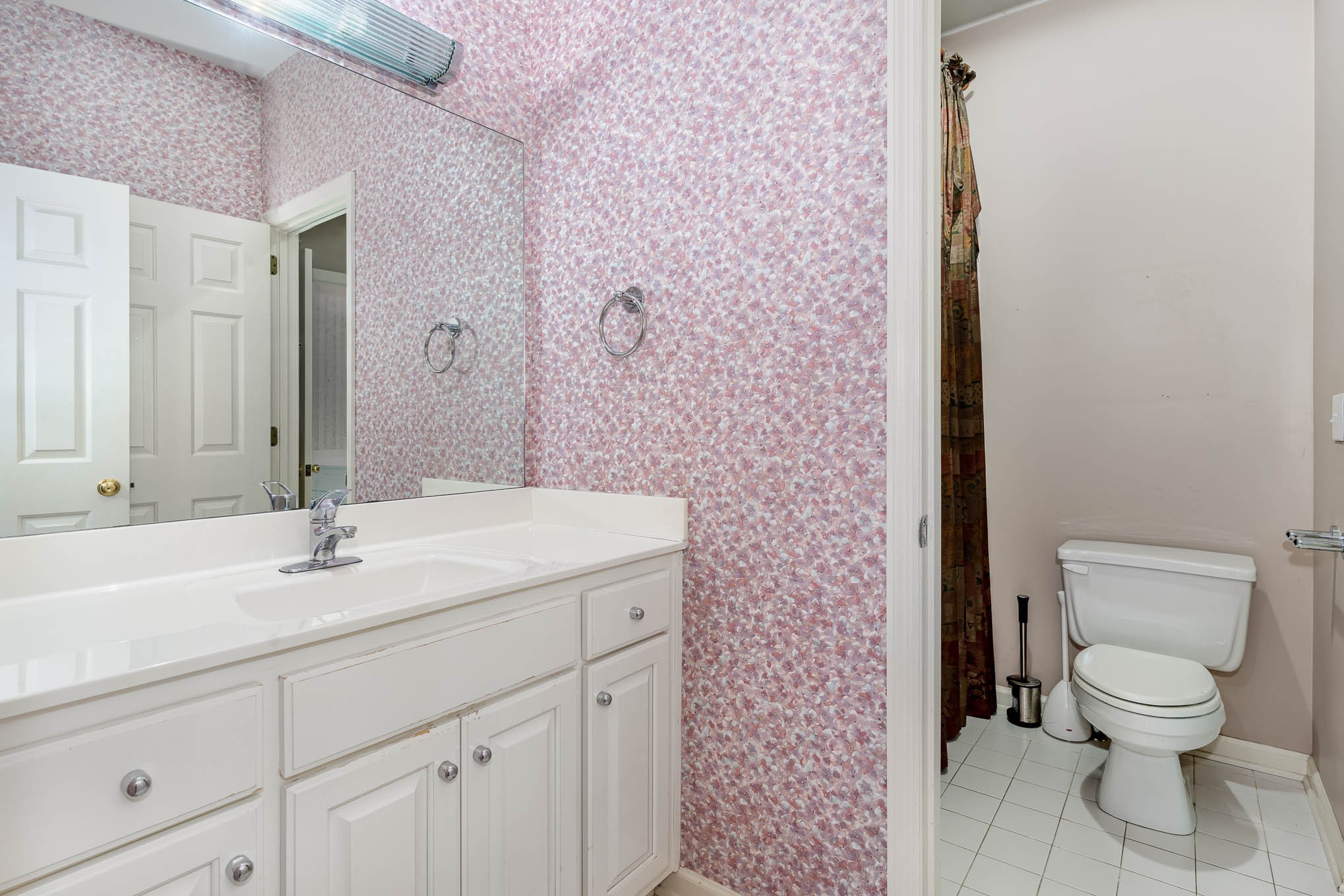 1102 Dora Whitley Road Franklin, TN 37064 - Photo 26 of 42 a bathroom with a sink a toilet and a mirror