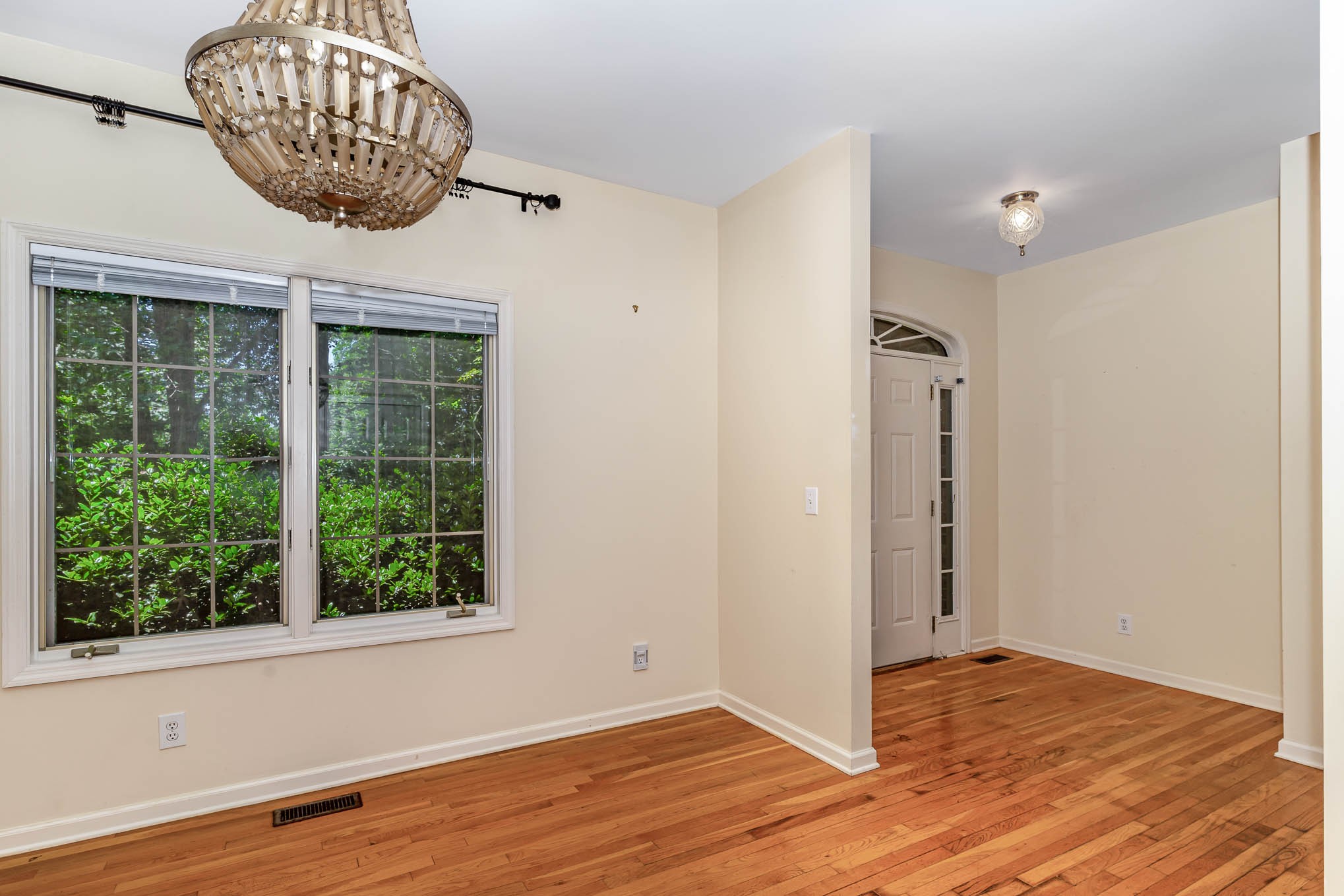 1102 Dora Whitley Road Franklin, TN 37064 - Photo 28 of 42 a view of an empty room with wooden floor and a window