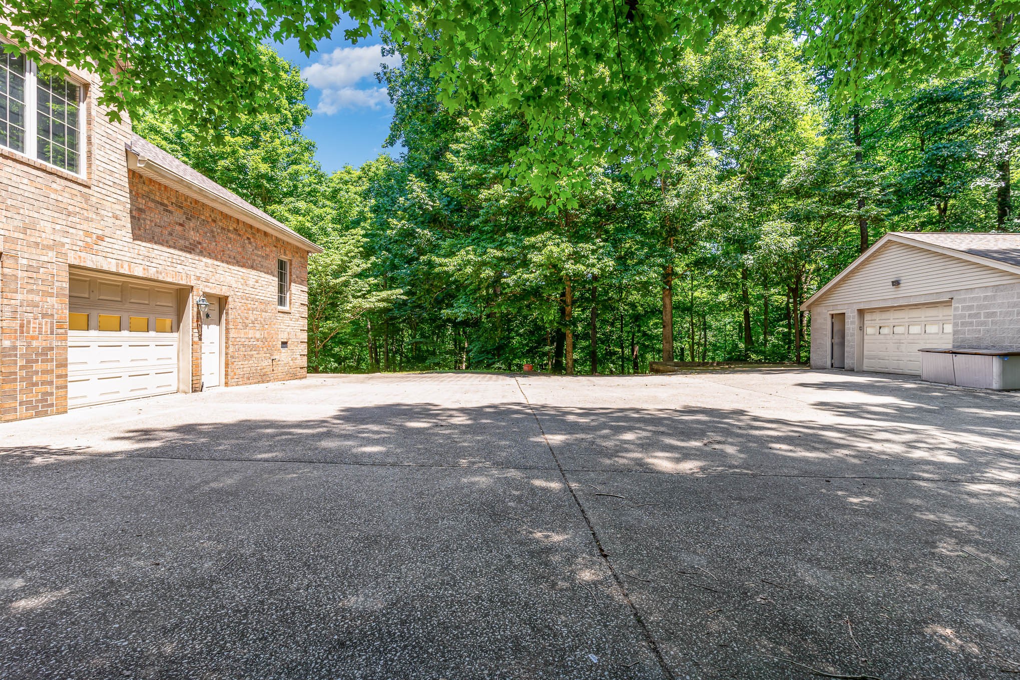 1102 Dora Whitley Road Franklin, TN 37064 - Photo 36 of 42 a view of a house with a yard and garage