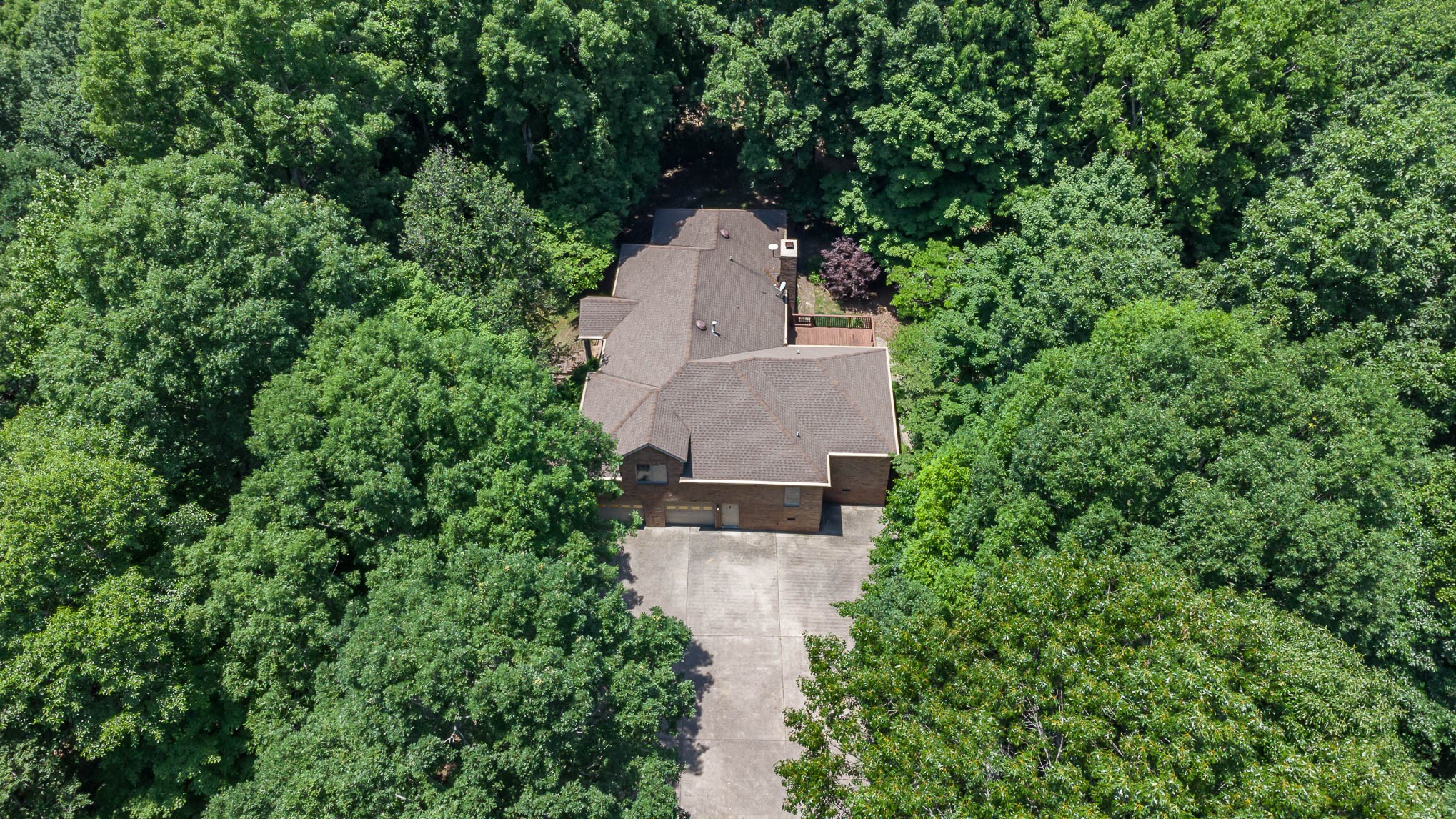 1102 Dora Whitley Road Franklin, TN 37064 - Photo 40 of 42 an aerial view of a house with outdoor space and trees all around