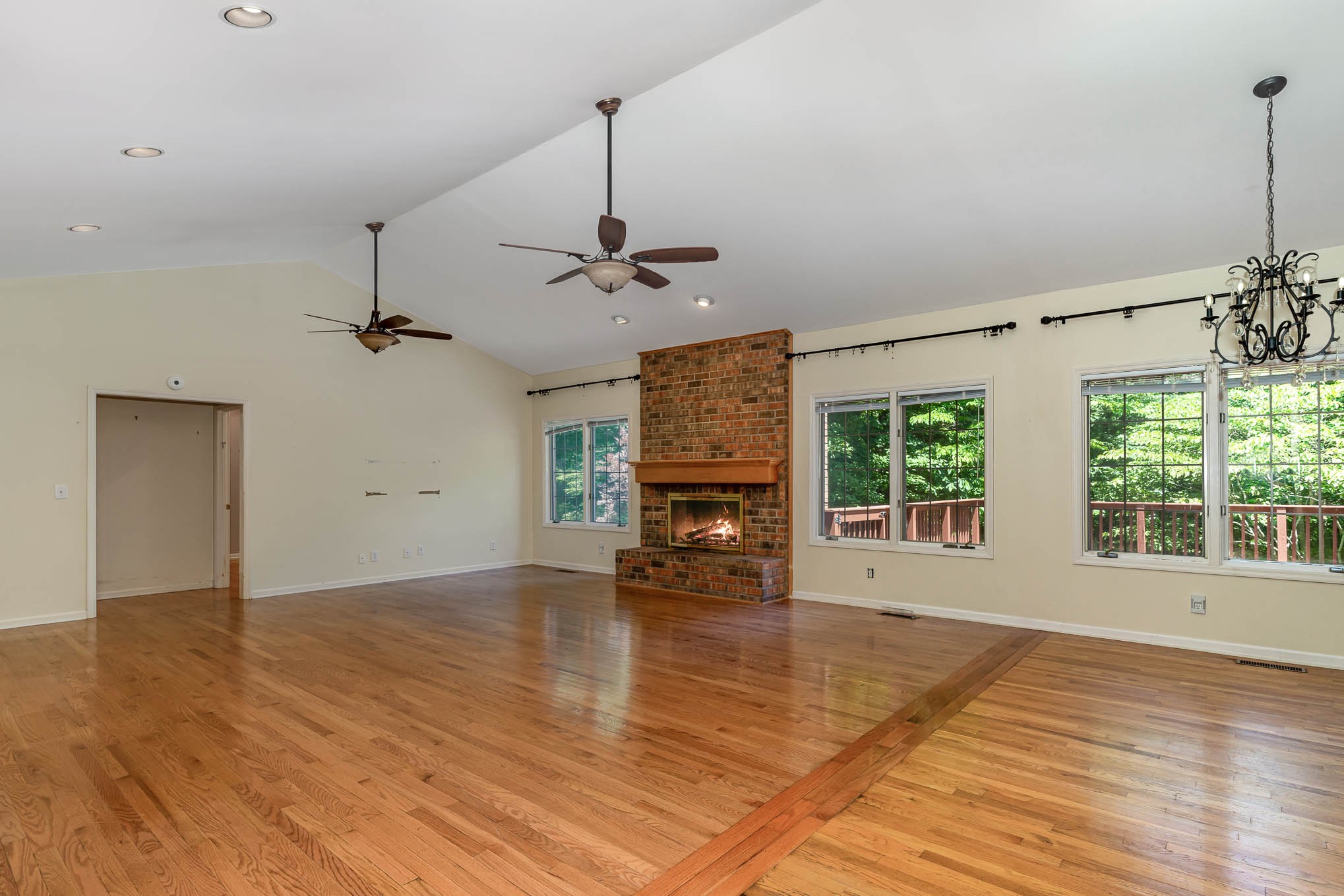 1102 Dora Whitley Road Franklin, TN 37064 - Photo 8 of 42 a view of an empty room with a window and wooden floor